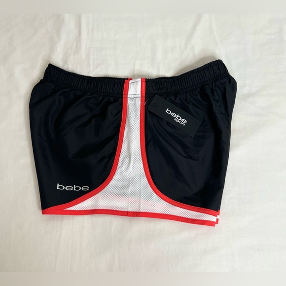 Women's BeBe athletic shorts size XL. Black White with Red stripes. - Picture 2 of 4